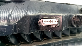 Right outer fender light for a 19-19 VW Jetta, scratches and cracks