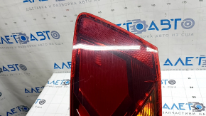 Right outer fender light for a 19-19 VW Jetta, scratches and cracks