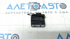 The towing hook cap for the rear bumper of a VW Jetta 19-21 is broken.