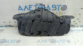 The lower control arm lining under the rear left spring is dented for an Audi A6 C8 19-25.