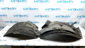 The front left fender liner of the Audi E-Tron 19-23 is broken in half.