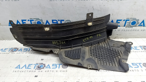 The lower right front fender liner of the Audi E-Tron 19-23 has cracks.