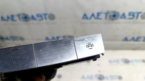 Audi E-Tron 19-23 center console button block, chrome for parking sensors and 360 cameras, minor scratches