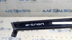 Right front panel insert for Audi E-Tron 19-23, gloss black with backlight, minor scratches