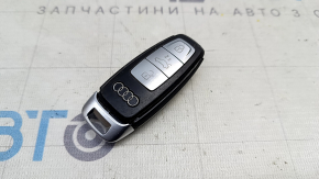2019 Audi Q8 e-tron smart key - 4 buttons, matte finish with chrome buttons, housing is torn, cracked, worn