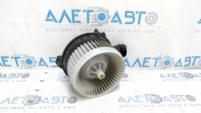 The heater fan motor on a 1993 Honda Accord has a broken mount.