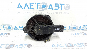The heater fan motor on a 1993 Honda Accord has a broken mount.