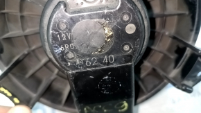 The heater fan motor on a 1993 Honda Accord has a broken mount.