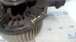 The heater fan motor on a 1993 Honda Accord has a broken mount.