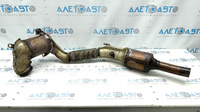 The exhaust pipe with catalytic converters for a VW Jetta 19-21 1.4T is rusty and the mesh is torn.