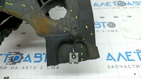 The front right fender liner of the Audi A6 C8 19-24 is broken and worn.
