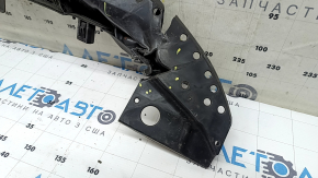 The front bumper lower absorber of Toyota Venza 21-24 is dented, worn, and has cracks.