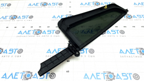 Rear left triangle door glass for a VW Tiguan 18-24, tinted, cracked seal, broken guide