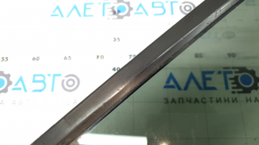 Rear left triangle door glass for a VW Tiguan 18-24, tinted, cracked seal, broken guide