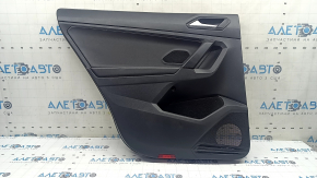 Rear left door panel for a VW Tiguan 18-20, black leather armrest, plastic insert, with handle, scratches