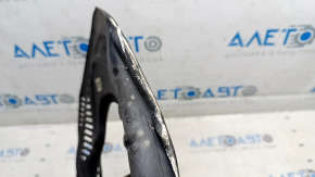 The front left brake disc cover of the Audi E-Tron 19-23 is dented.