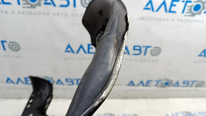 The front right brake disc cover of the Audi E-Tron 19-23 is dented.