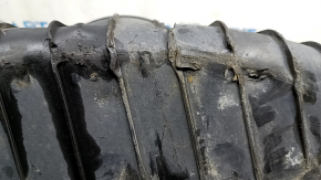 The lower control arm cover under the rear right spring is worn out for the Audi E-Tron 19-23.