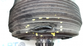 The rear left air spring on an Audi E-Tron 19-23 has a punctured casing.
