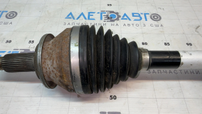 The front right half shaft of a Toyota Sienna 21-26 is rusty and the threads are stripped.