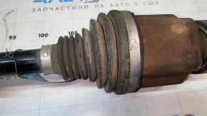 The front right half shaft of a Toyota Sienna 21-26 is rusty and the threads are stripped.