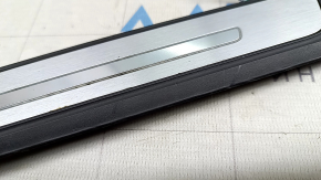 Audi E-Tron 19-23 black outer rear right door sill trim with chrome and backlight, worn