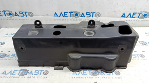 The air suspension compressor cover on the Audi E-Tron 19-23 is cracked.