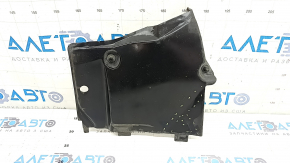The front right underbody protection of the Audi A5 F5 18-25 is pressed and worn.