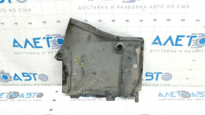 The front right underbody protection of the Audi A5 F5 18-25 is pressed and worn.