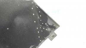 The front right underbody protection of the Audi A5 F5 18-25 is pressed and worn.