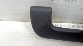 The rear right ceiling handle of the Audi E-Tron 20-23 is black and has some wear.
