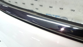 Jeep Compass 22-26 tailgate trim panel under glass with chrome molding, scratches