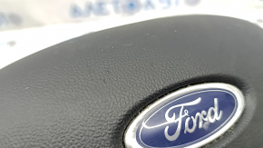 Black, scratched steering wheel airbag for the Ford Escape MK4 20-26.