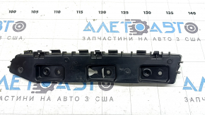 The rear bumper outer left mount for a Ford Escape MK4 20-26 is broken.
