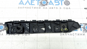 The rear bumper outer left mount for a Ford Escape MK4 20-26 is broken.