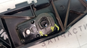 The rear bumper outer left mount for a Ford Escape MK4 20-26 is broken.
