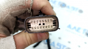 The wiring for the rear bumper of a Ford Escape MK4 20 for parking sensors and a foot-operated trunk opening sensor has been cut off.