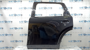 The bare rear left door of a Mazda CX-90 24-26