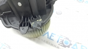 The heater fan motor on a Jeep Compass 22-26 has a broken mount.