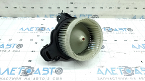 The heater fan motor on a Jeep Compass 22-26 has a broken mount.