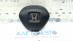 The Honda Accord 18-22 driver's steering wheel airbag is black and scratched.