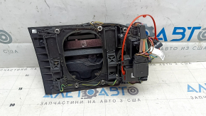 The left charging port housing of the Audi E-Tron 19-23 is bare, without the charging pattern on the cover.