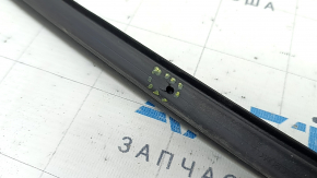 Mazda CX-90 24-26 rear hood seal on the grille, fasteners are torn
