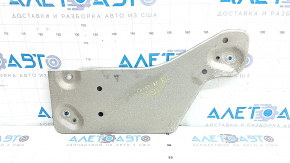 The right rear subframe guard for a Mazda CX-90 24-26 is dented.