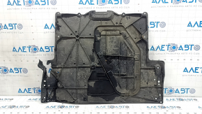 The front engine guard for a Mazda CX-90 24-26 is dented, cracked, and missing a fragment.