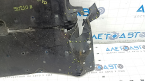 The front engine guard for a Mazda CX-90 24-26 is dented, cracked, and missing a fragment.