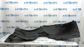 The front right fender liner of a Mazda CX-90 24-26 is dented.