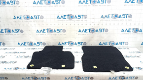 Set of Mazda CX-90 24-26 black floor mats, ready for cleaning