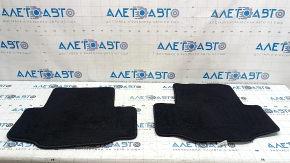 Set of Mazda CX-90 24-26 black floor mats, ready for cleaning