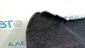 The battery cover of the Ford Fusion mk5 13-20 hybrid is dented.